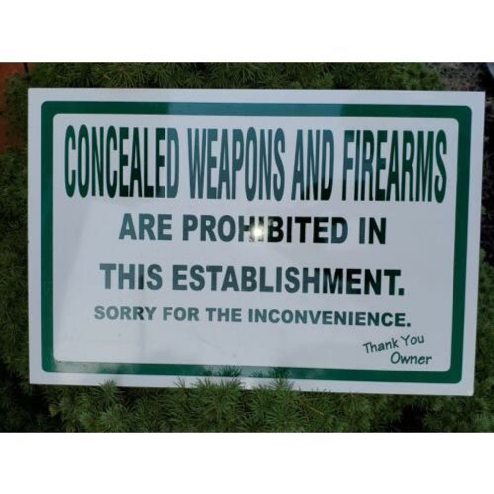 Horizontal Metal Sign Concealed Weapons and Firearms are Prohibited